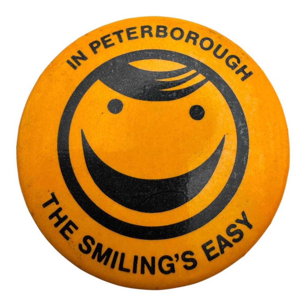 Vintage Peterborough Ontario Pinback Button – “The Smiling’s‎ Easy” 2” Badge